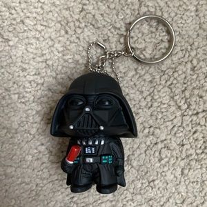 Darth Vader keychain never been used. Has a silver chain.